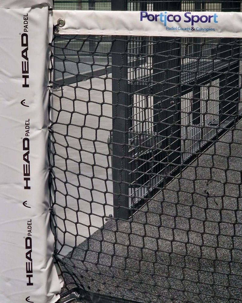 Net post branded Portico Sport and HEAD